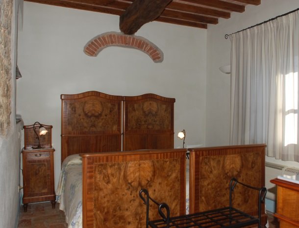 podere-alberese-asciano-toscane-slaapkamer.jpg