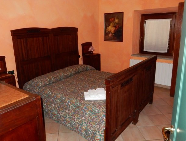 agriturismo-il-ghiaccio-suvereto-appartement-kamer-bed.jpg