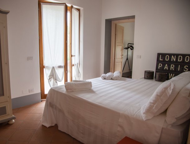 agriturismo-il-giuggiolo-appartement-orione-slaapkamer.jpg