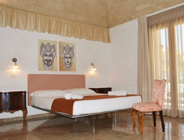 bed-and-breakfast-ricordi-siciliani-sanvitolocapo-2-persoonskamer-begane-grond-bed.jpg