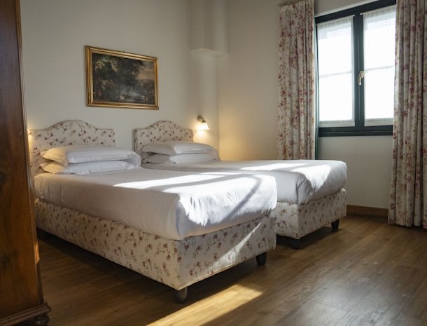 Albafiorita-agriturismo-latisana-friuli-slaapkamer-losse-bedden.jpg