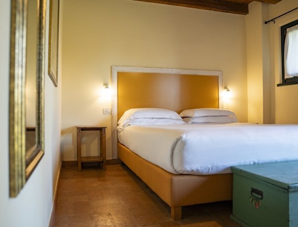 Albafiorita-agriturismo-latisana-friuli-slaapkamer-bed-standaard.jpg