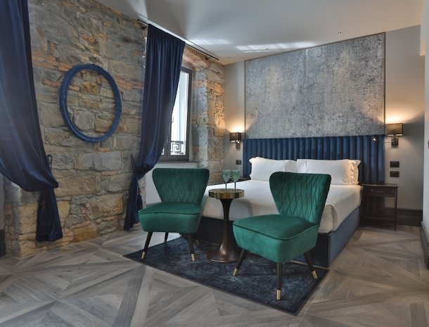 Forvm-Boutique-Hotel-Trieste-suite-bed.jpg